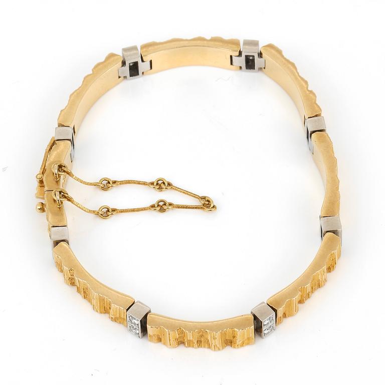 ARMBAND, 18K guld, 16 diamanter, Lapponia, 1984. Vikt ca 30g.