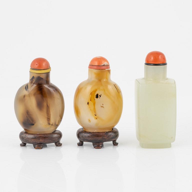 Ten snuff bottles, stone, glass and cloisonné, China, 20th century.