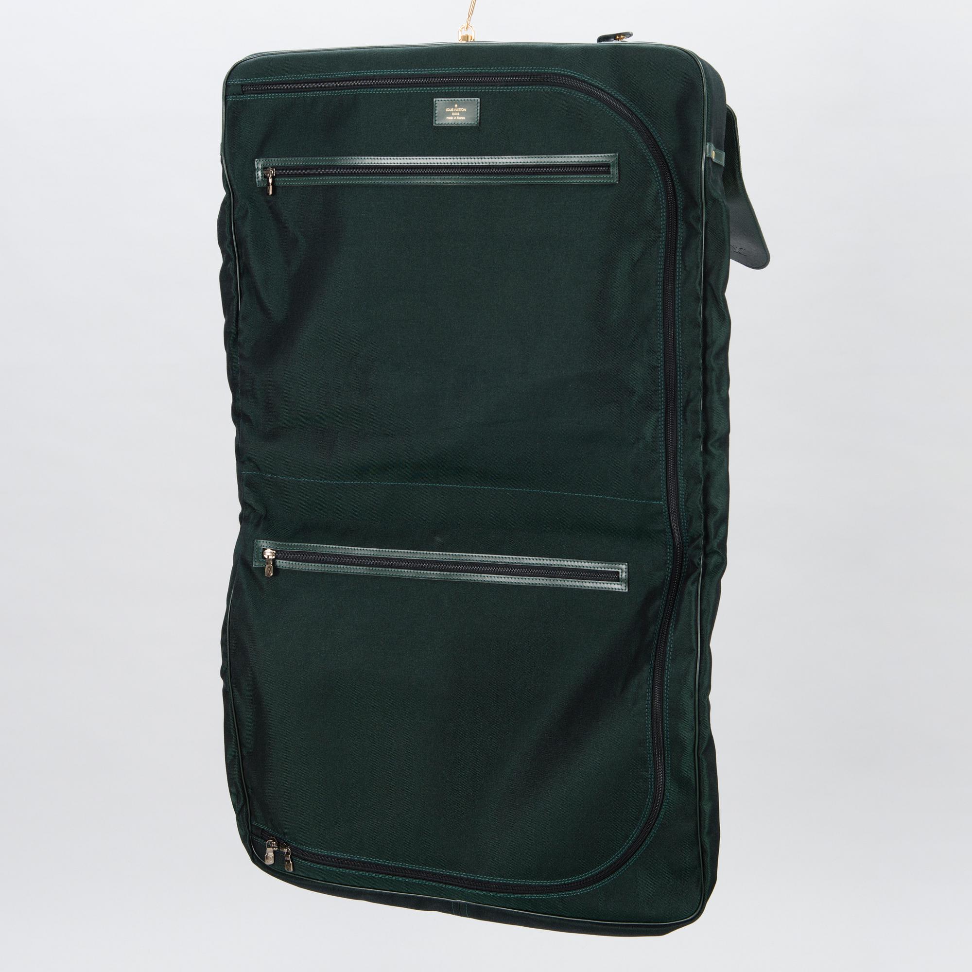 LOUIS VUITTON, TAIGA and NYLON GARMENT BAG.