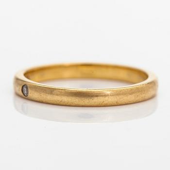 Tiffany & Co, Elsa Peretti, an 18K gold ring, with a small diamond.