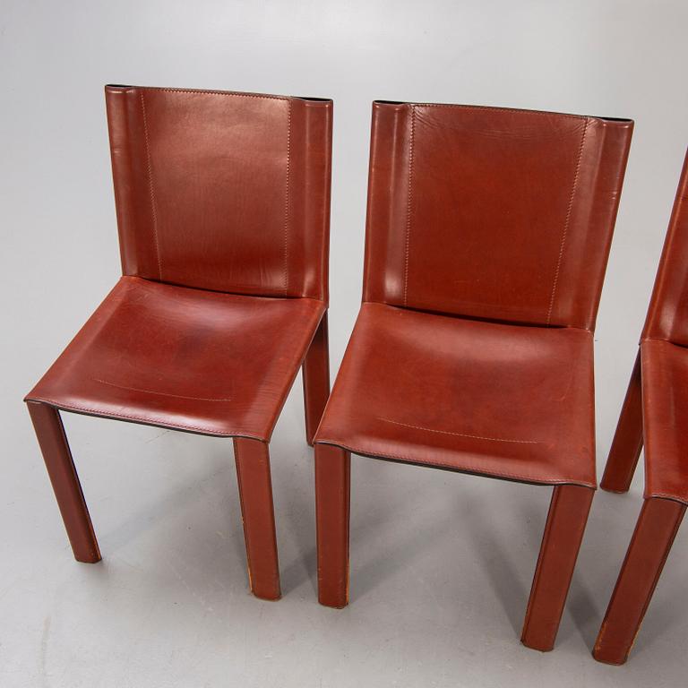 A set of four Matteo Grassi leather chairs alter part of the 20th century.
