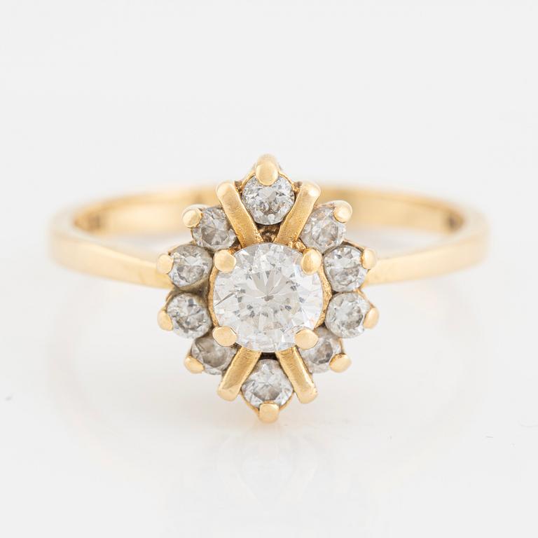 Ring, 18K gold with faceted white stones.