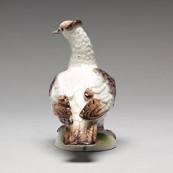 A porcelain figure of a dove, possibly Samson.