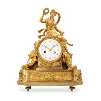 550. A French Empire early 19th century gilt bronze mantel clock.