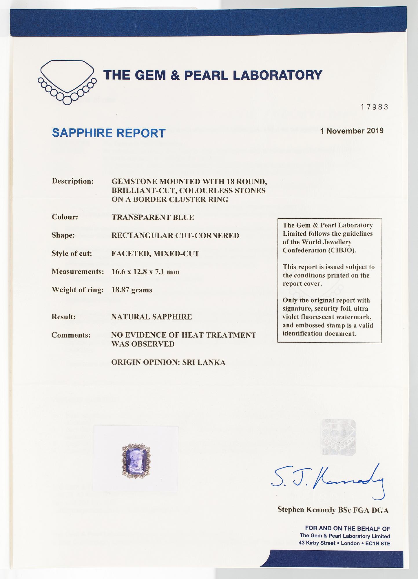 A platinum ring with a ca. 18.00 ct sapphire and ca. 3.00 cts of diamonds. With certificates.