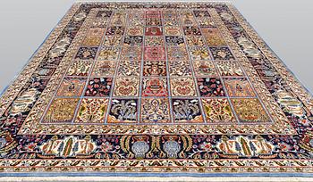A Figural Sarouk carpet, c. 348 x 240 cm.