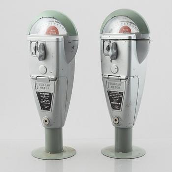 Parking meters, a pair, "Duncan Meter", Duncan Industries U.S.A, second half of the 20th century.