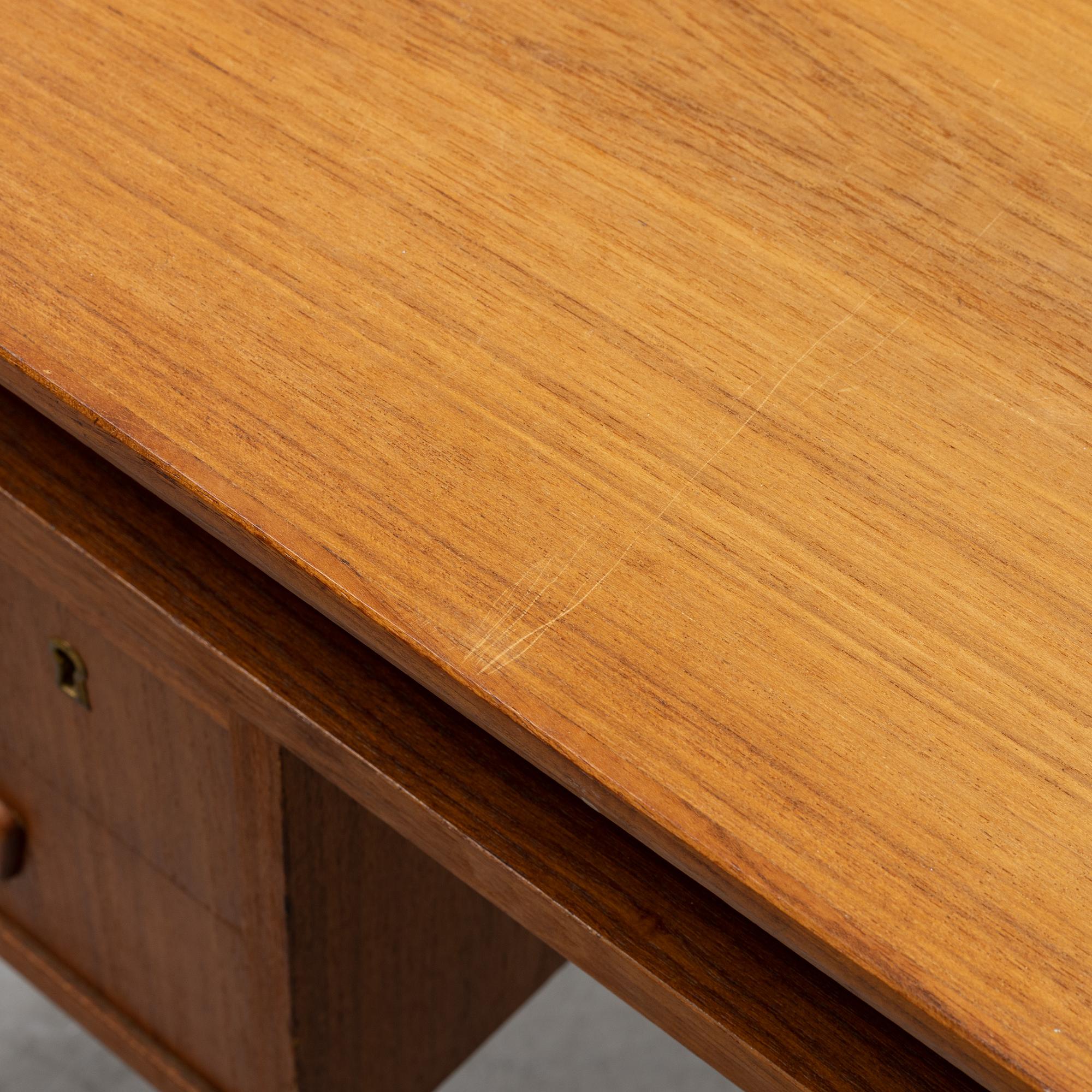 A 1960's teak writing desk.