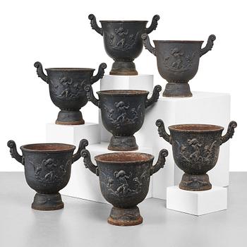 Ivar Johnsson, a set of seven Swedish Grace black painted cast iron jardenieres by Näfveqvarns Bruk, Sweden.