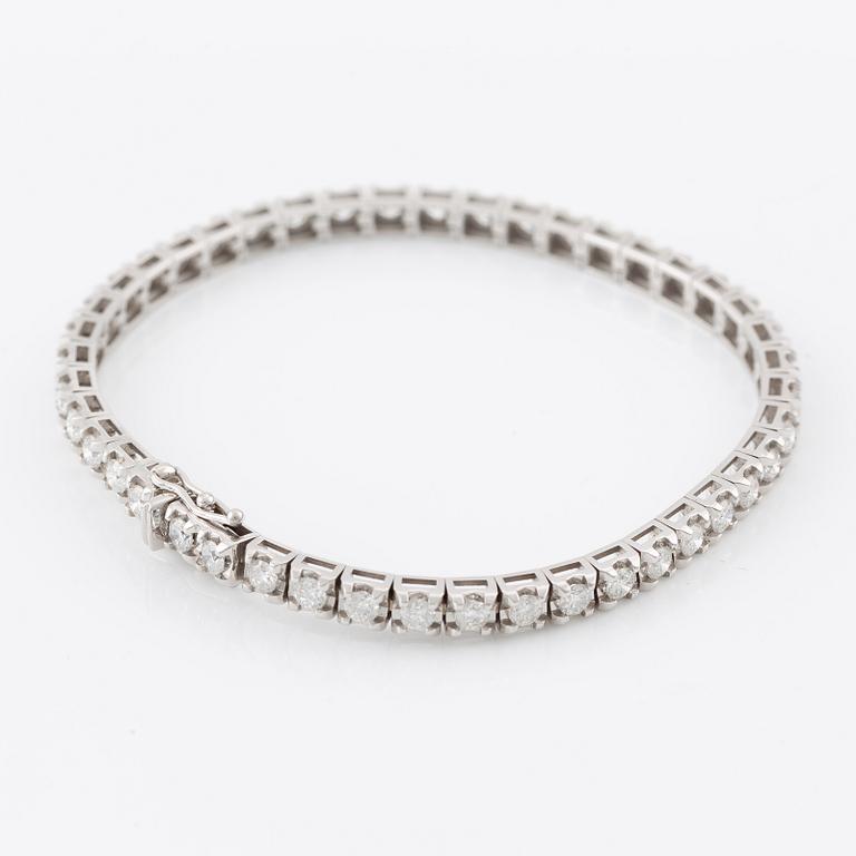 Tennis bracelet, 18K white gold with brilliant-cut diamonds.