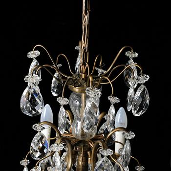 LJUSKRONAN, barockstil, 1900-talets första hälft. Höjd 79 cm.