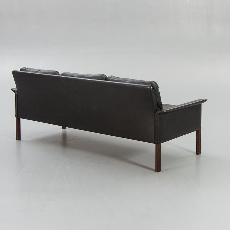 A 1960/70s leather sofa.