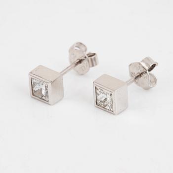 A pair of square modified brilliant cut diamond earrings.