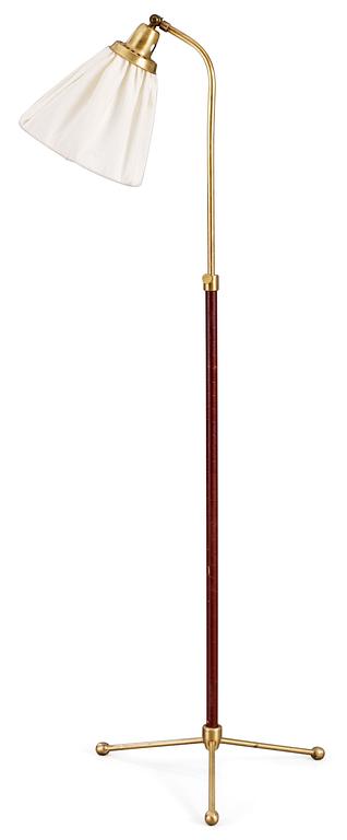 A Hans Bergström brass and leather floor lamp by Ateljé Lyktan, 1950's.