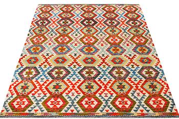 A Kilim carpet, c. 301 x 203 cm.