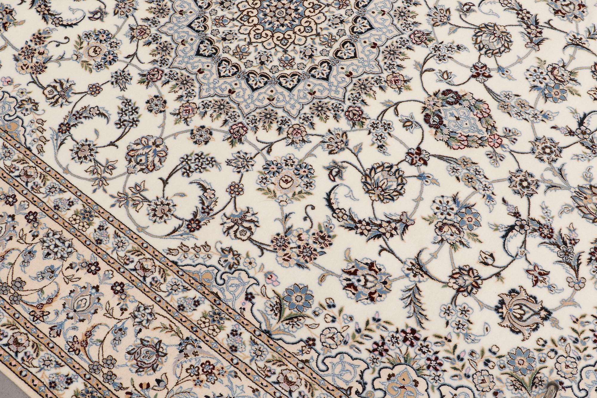 A carpet, Nain part silk s.k 6LAA, ca 310 X 209 cm.