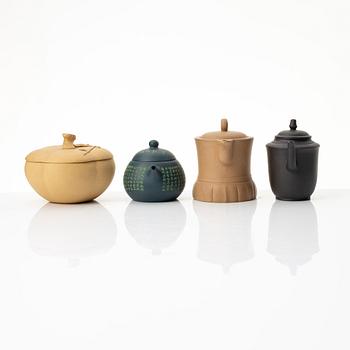 A group of three yixing teapots and a box with cover, China, 1970/80s.