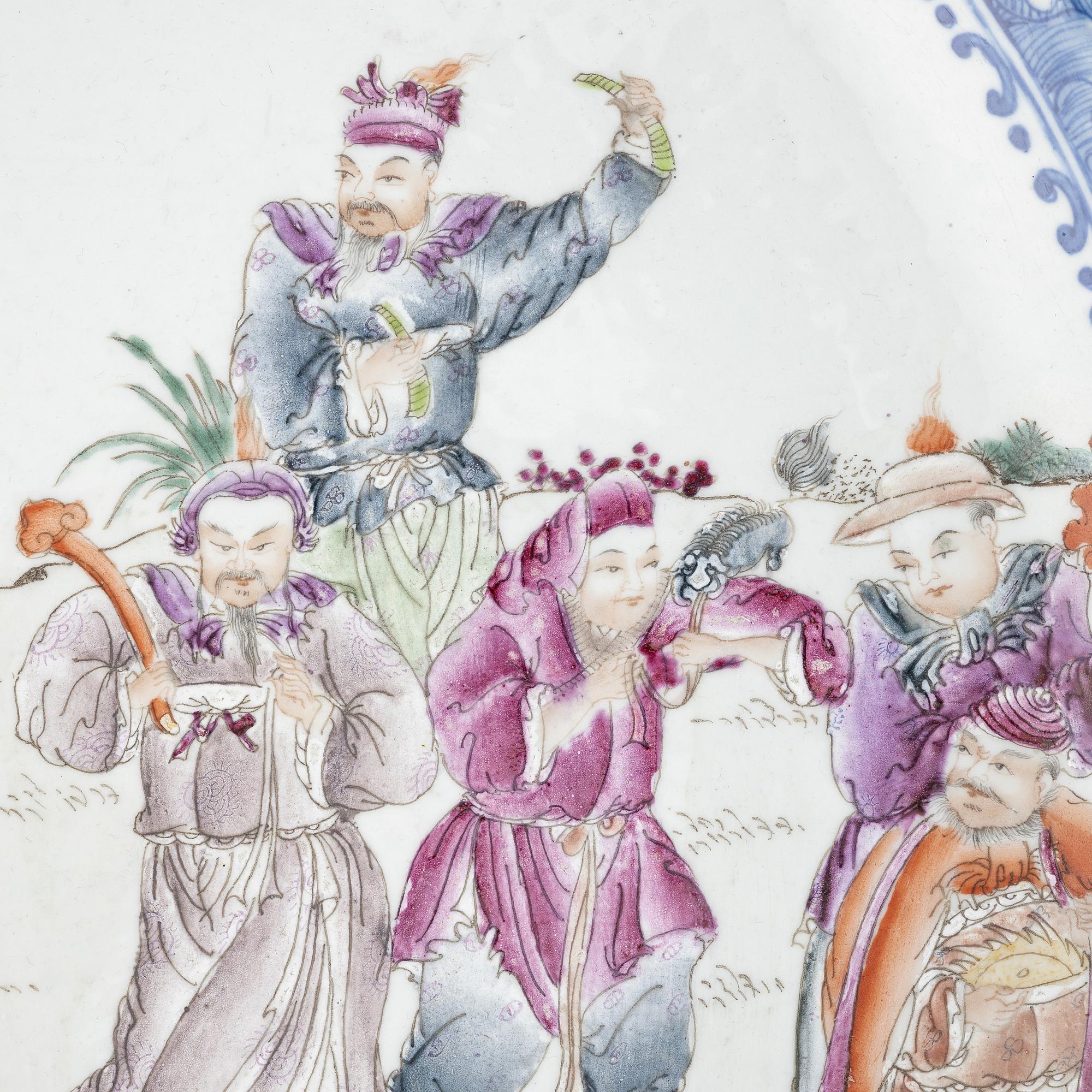A large Chinese porcelain dish depicting the eight immortals, second half of the 20th century.