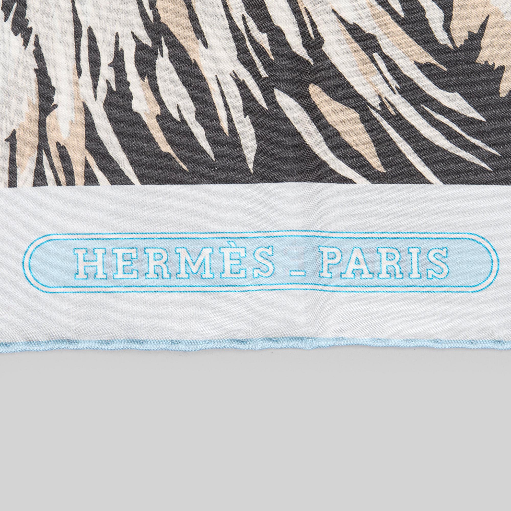 Hermès, a 'Tigre Royal Double Face' silk scarf.