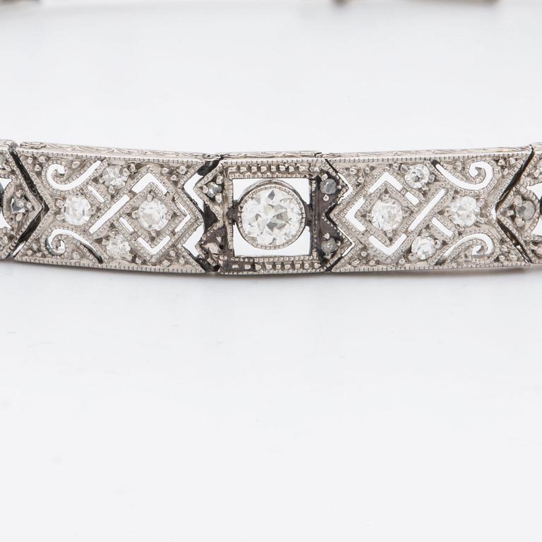 DIAMOND BRACELET, probably platinum, old and rose-cut diamonds approx 2 ct in total, 1 large stone not diamond.