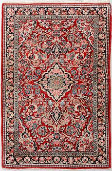 A semaitnique Sarouk carpet ca 204x128 cm.