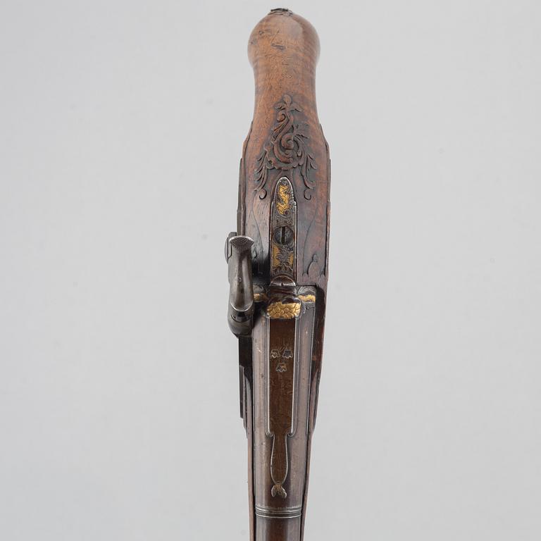 Slaglåspistoler, ett par, ändrade från flintlås,  Nusbaum Stockholm, 1700-talets mitt.