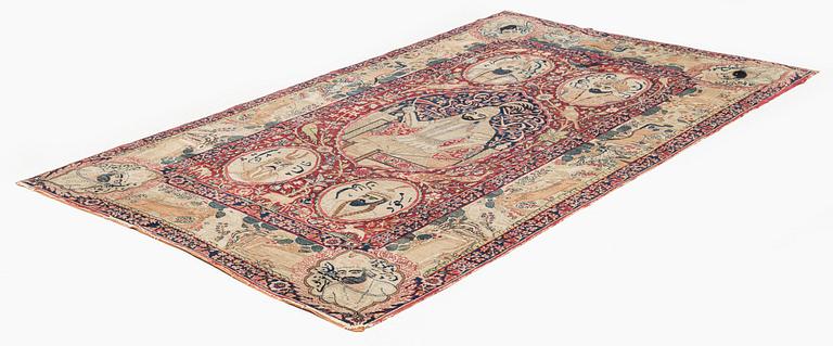 An antique pictoral Kerman Laver rug, south east Persia (Iran) c. 212 x 138 cm.