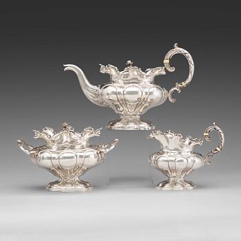 724. A Russian 19th century parcel-gilt three piece tea-set, marks of Sasikow, Moscow 1839.