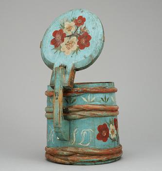 A Swedish wood jug, dated 1824.