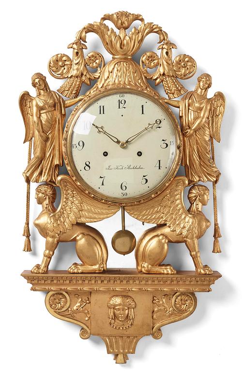 A late Gustavian giltwood cartel clock by J. Kock (royal watchmaker, active 1762-1803).