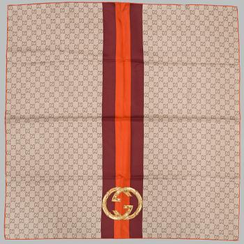 Scarf by Gucci.