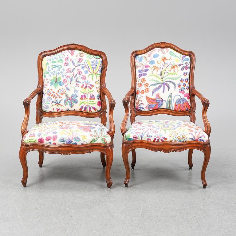 Two 18th century French Louis XV walnut armchairs.
