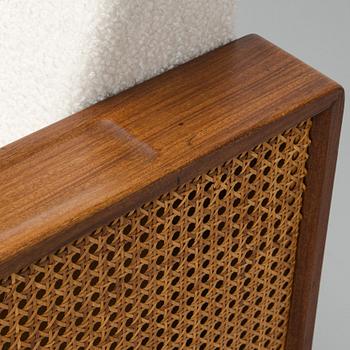 A pair of 1960s armchairs.