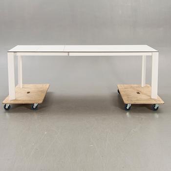 Caronni & Bonanomi, a "Every + Grid" dining table for Desalto 21st century.