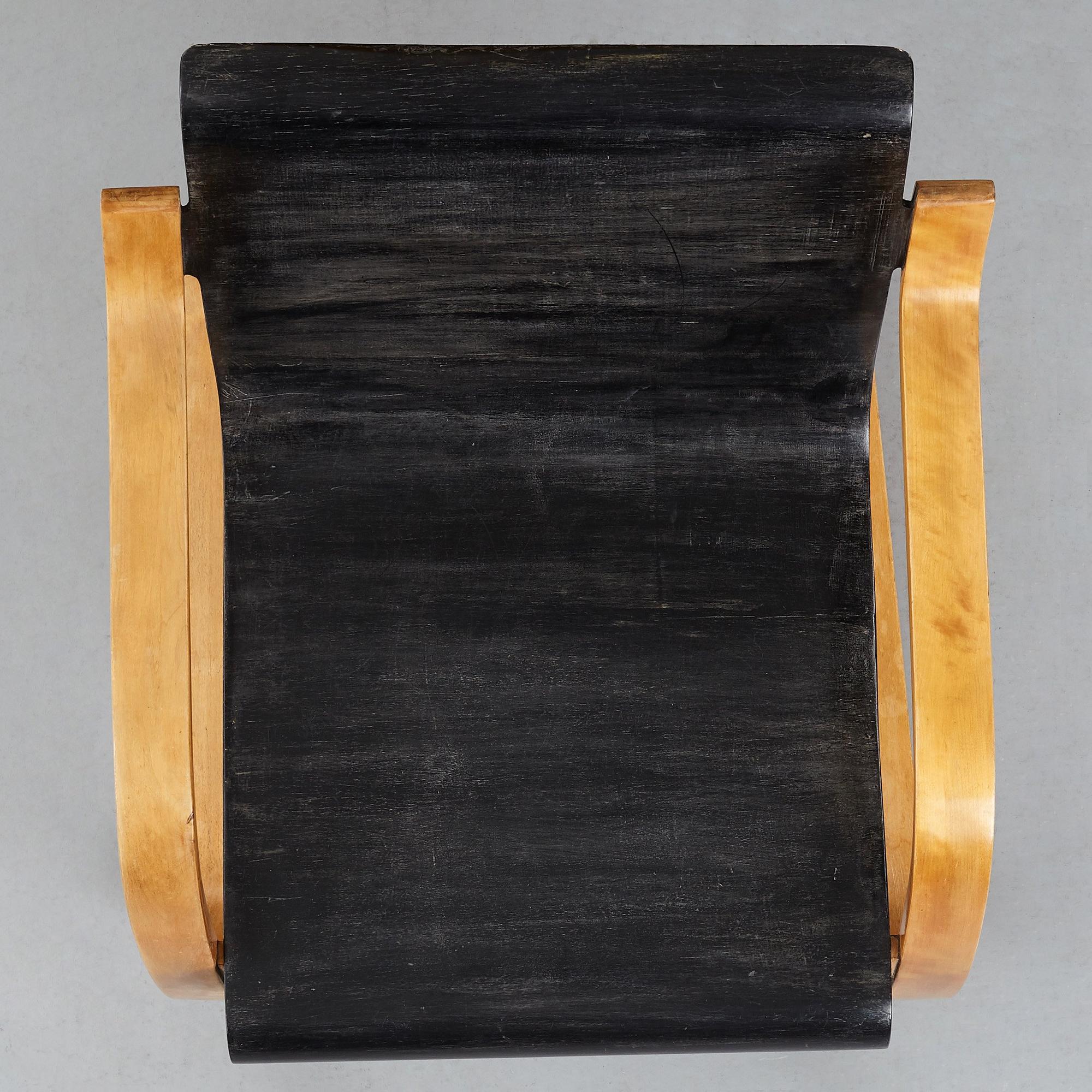ALVAR AALTO, a birch plywood model 31 cantilevered chair, karmstol, modell nr 31, O.y Huonekalu-ja Rakennustyötehdas, Finland.