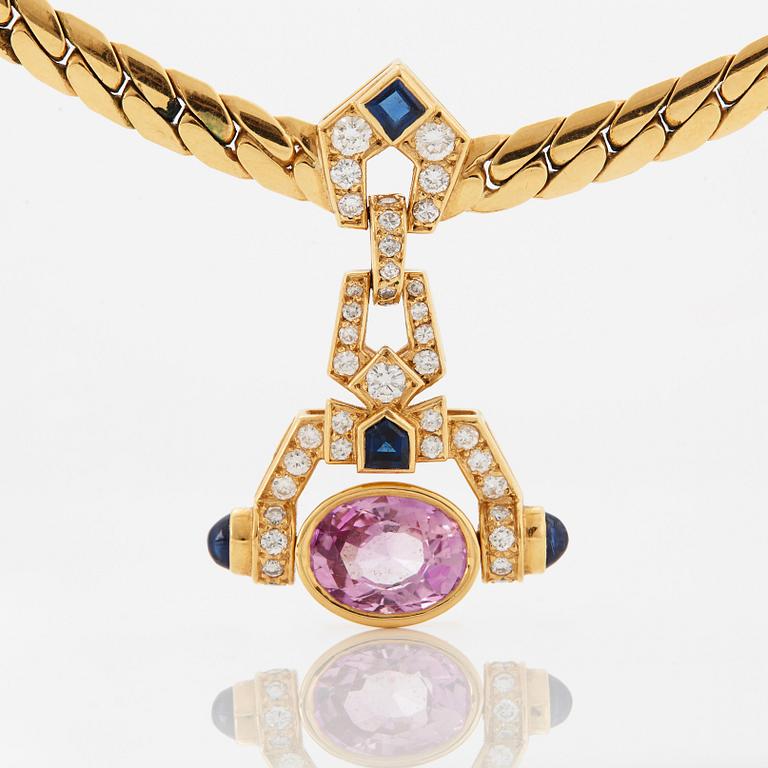 A Cartier necklace in 18K gold set with a pink sapphire and round brilliant-cut diamonds.
