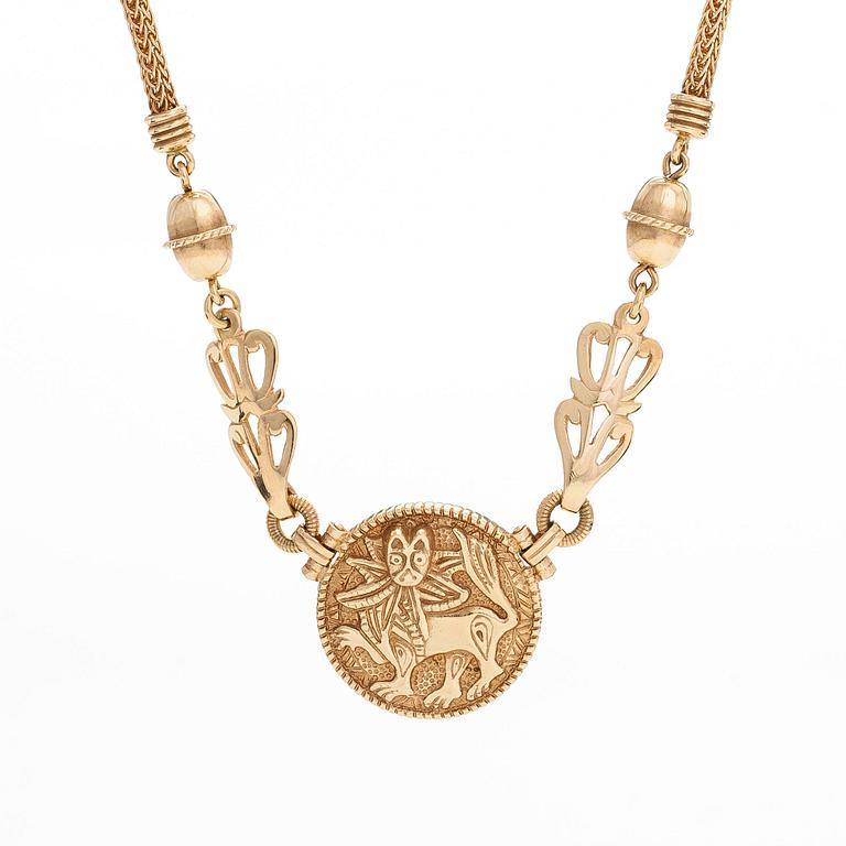 Kalevala Koru, an 18K gold 'Sun Lion* necklace, Helsinki 1997, numbered 137/180.