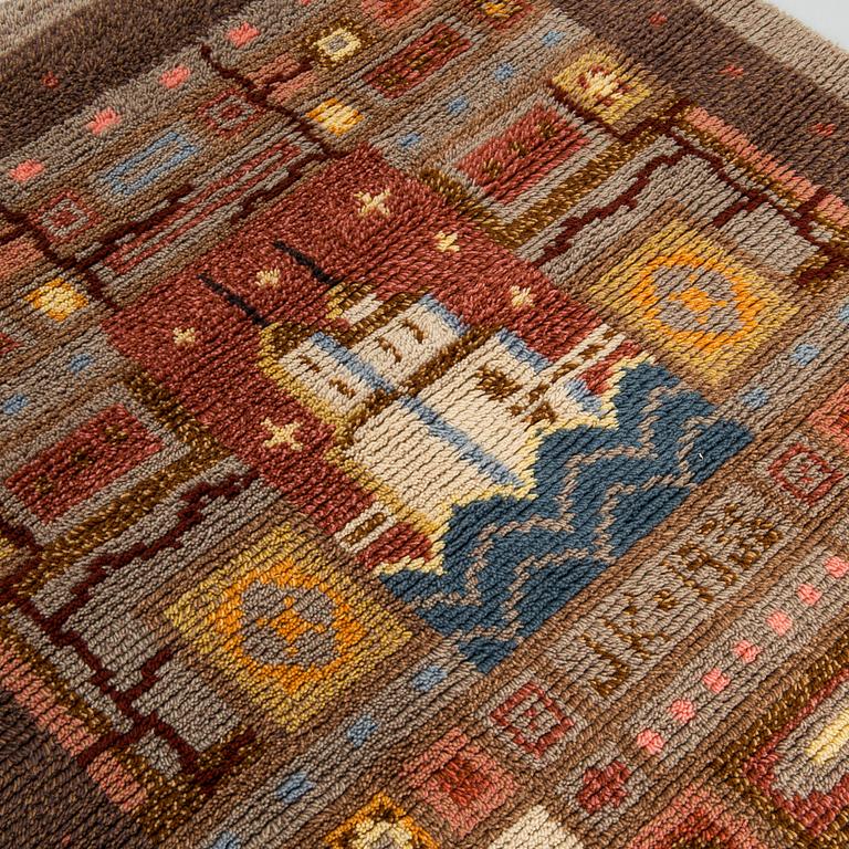 Pia Katerma, ryijy, Kajaanin kaupunginvaakuna. Päivätty 1936. Noin 196x130 cm.