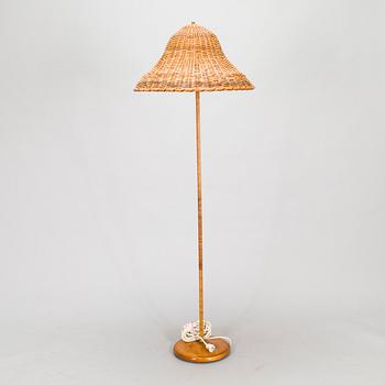 A mid-20th century floor lamp.