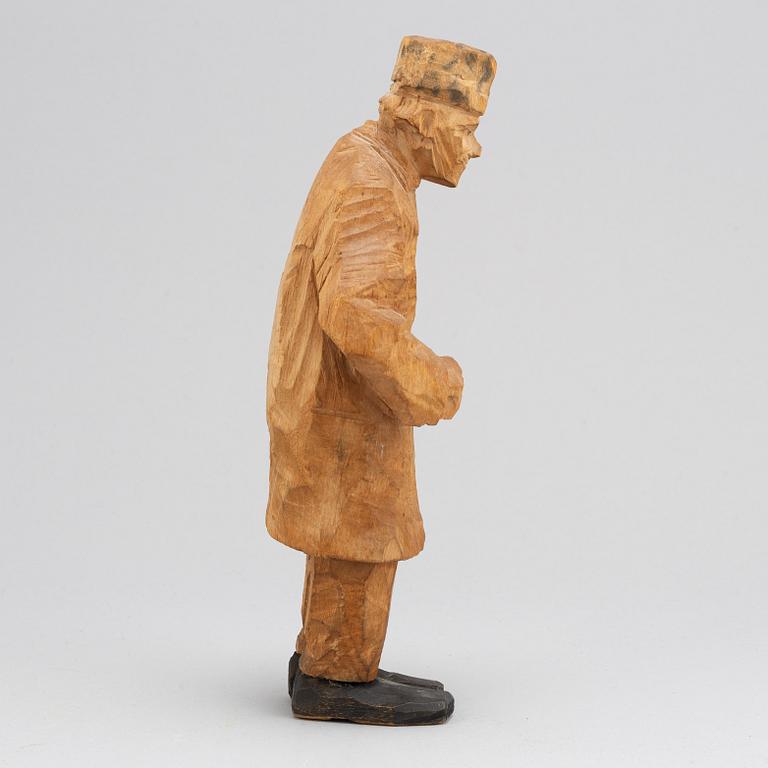 Axel Petersson Döderhultarn, sculpture. Signed. Carved and partly painted wood. Height 25.5 cm.