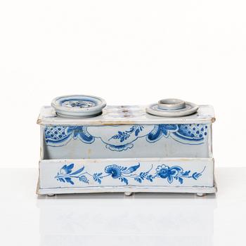 A Swedish Rörstrand faience desk set, dated Stockholm 24/10 1750.