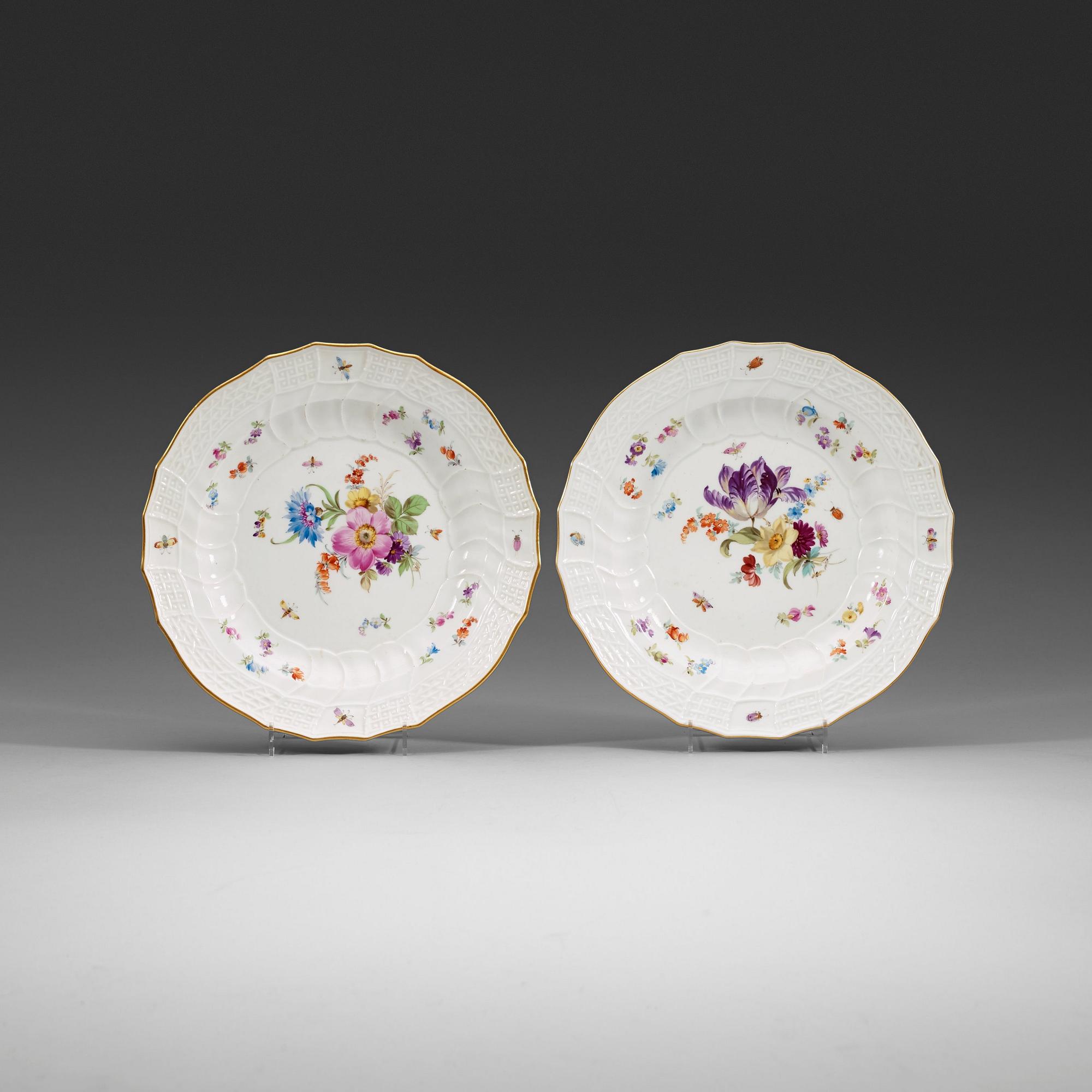 A pair of Meissen dinner plates, "Scattered flowers" with Kaiser Wilhelm II's monogram, dated 1894 and 1897.