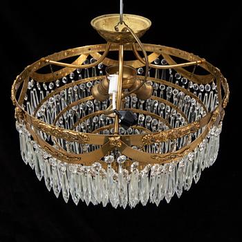 An end of the 20th Century ceiling light with prisms.