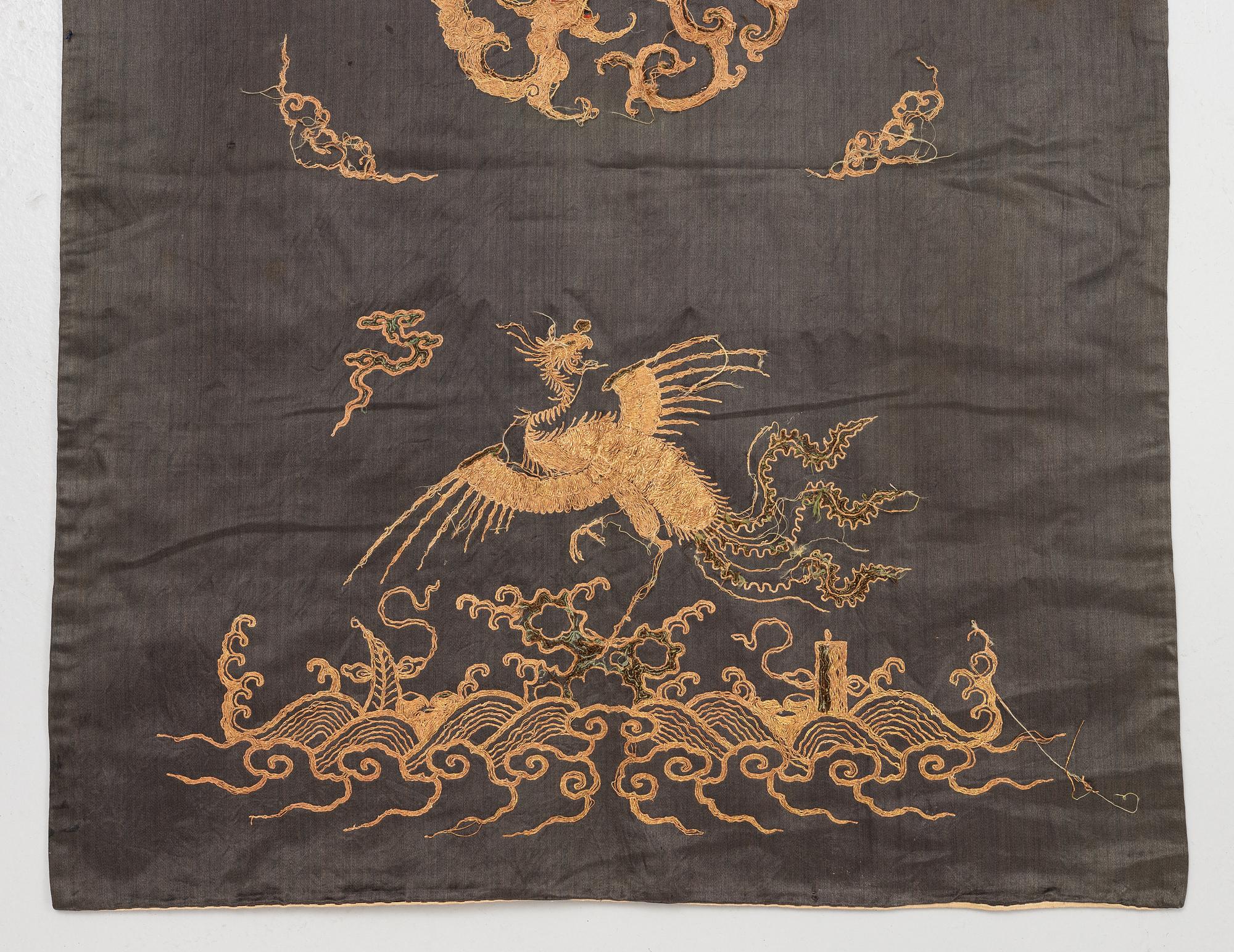 A Chinese emboridered silk chair cover, Qing dynasty, 19th century.
