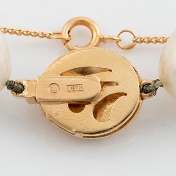 A Cultured South sea pearl necklace, clasp with brilliant cut diamonds.