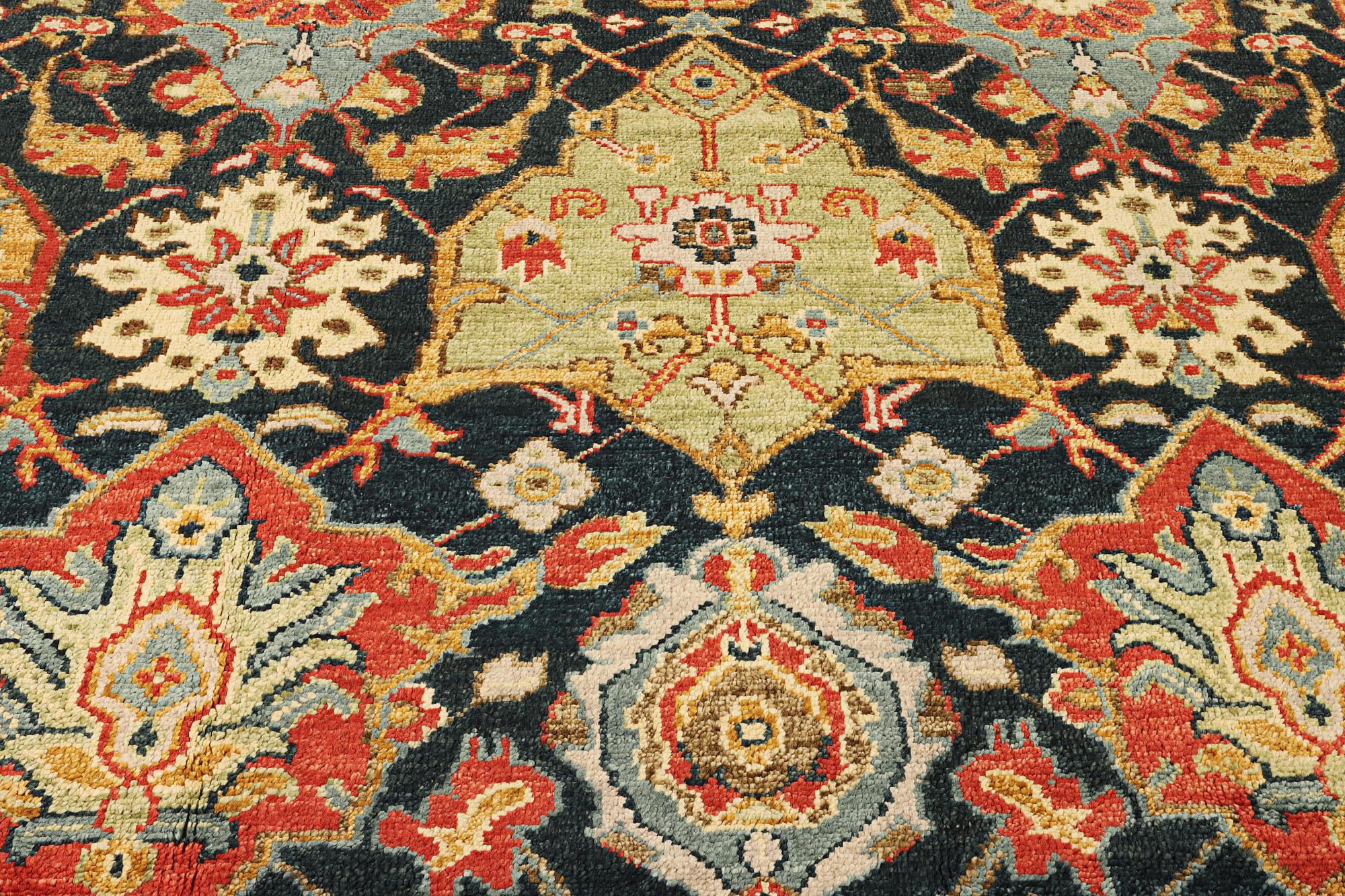 An oriental carpet with Mamluk design, a. 331 x 274 cm.