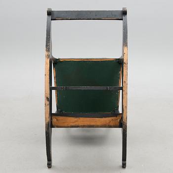 An empire style rocking chair from the end of the 19th Century.