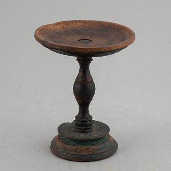 A 19th century wooden butter stand.