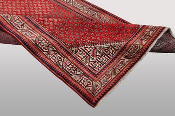 A Sarouk mir rug, c. 208 x 134 cm.