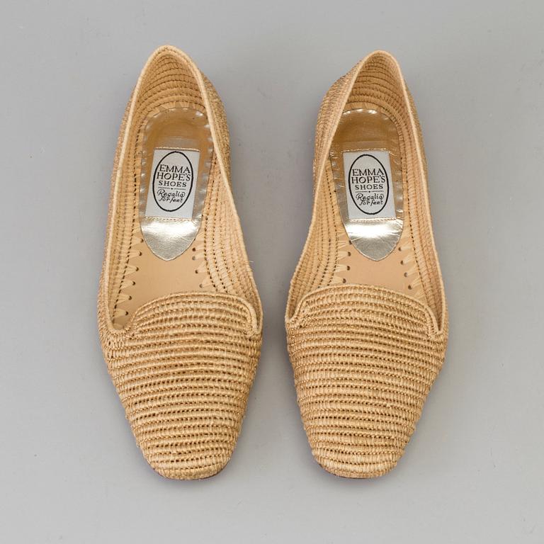 A pair of raffia shoes by Emma Hope's.